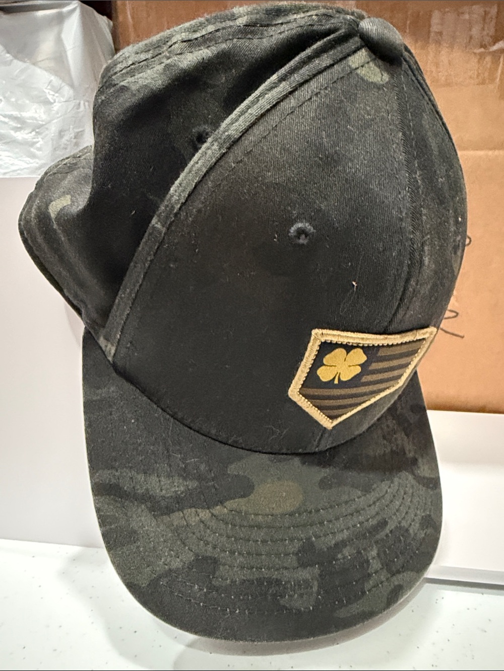 Men's Black Camouflage Baseball Cap with Gold Clover Patch